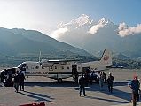 10 Deplaning At Jomsom Airport With Nilgiri North Behind